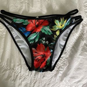 Medium Hawaiian themed swimsuit bottoms from SHEIN